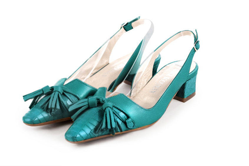 French elegance and refinement for these turquoise blue dress slingback shoes, with a knot, 
                available in many subtle leather and colour combinations. The pretty French spirit of this beautiful pump will accompany your steps nicely and comfortably.
To be personalized or not, with your materials and colors.  
                Matching clutches for parties, ceremonies and weddings.   
                You can customize these shoes to perfectly match your tastes or needs, and have a unique model.  
                Choice of leathers, colours, knots and heels. 
                Wide range of materials and shades carefully chosen.  
                Rich collection of flat, low, mid and high heels.  
                Small and large shoe sizes - Florence KOOIJMAN
